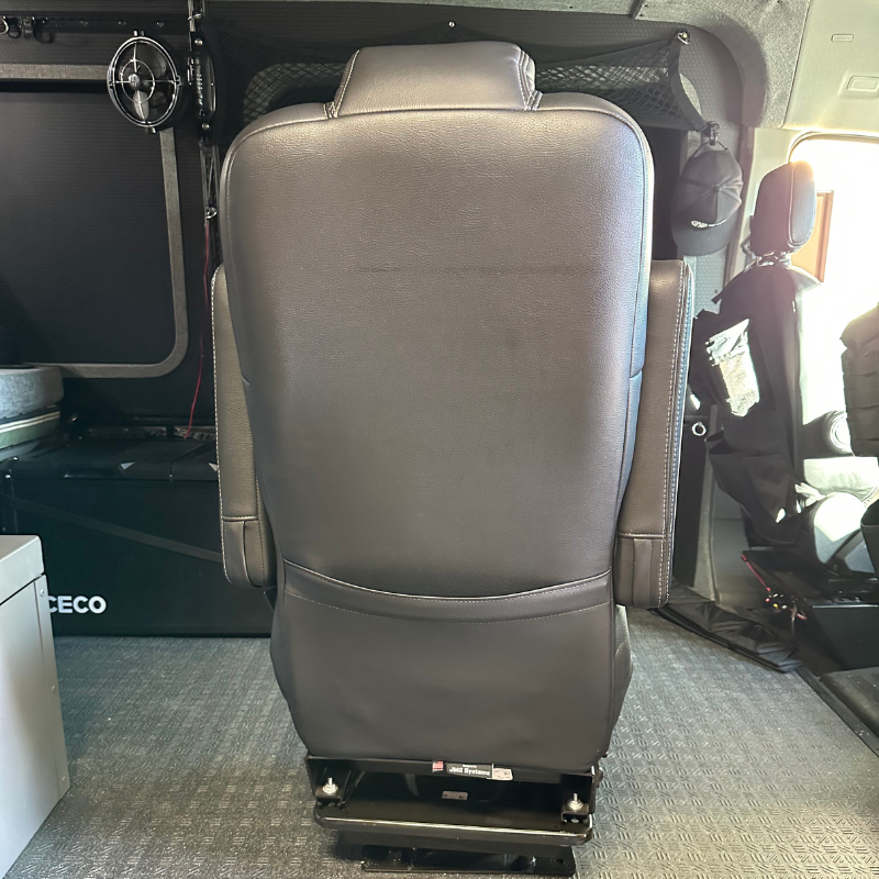 Back view of swivel chair in Transit van